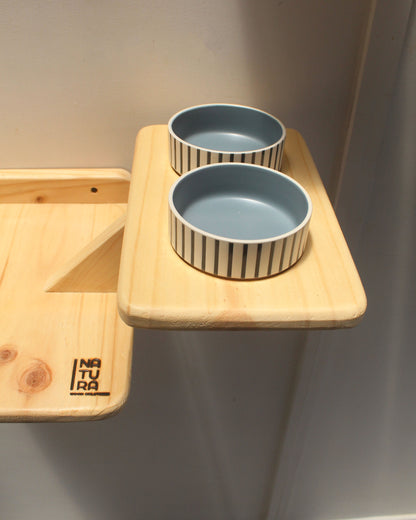 Descansador con comedero